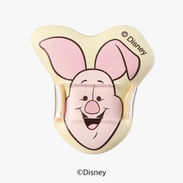 白背景に、ディズニーキャラクターのピグレットの顔が描かれたクリップまたはブックマーク