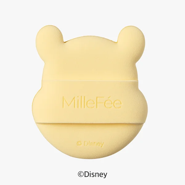 黄色いクマの形をしたMilleFéeの化粧用スポンジ