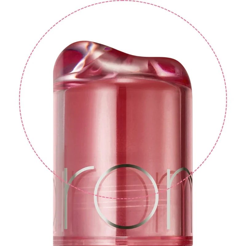 透明感のあるピンク色のコスメ製品のクローズアップ画像