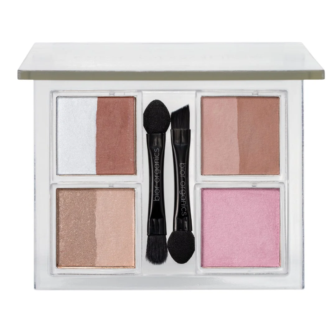 白、茶系、ピンクなどのアイシャドウやチークが4区画に分かれたメイクアップパレット