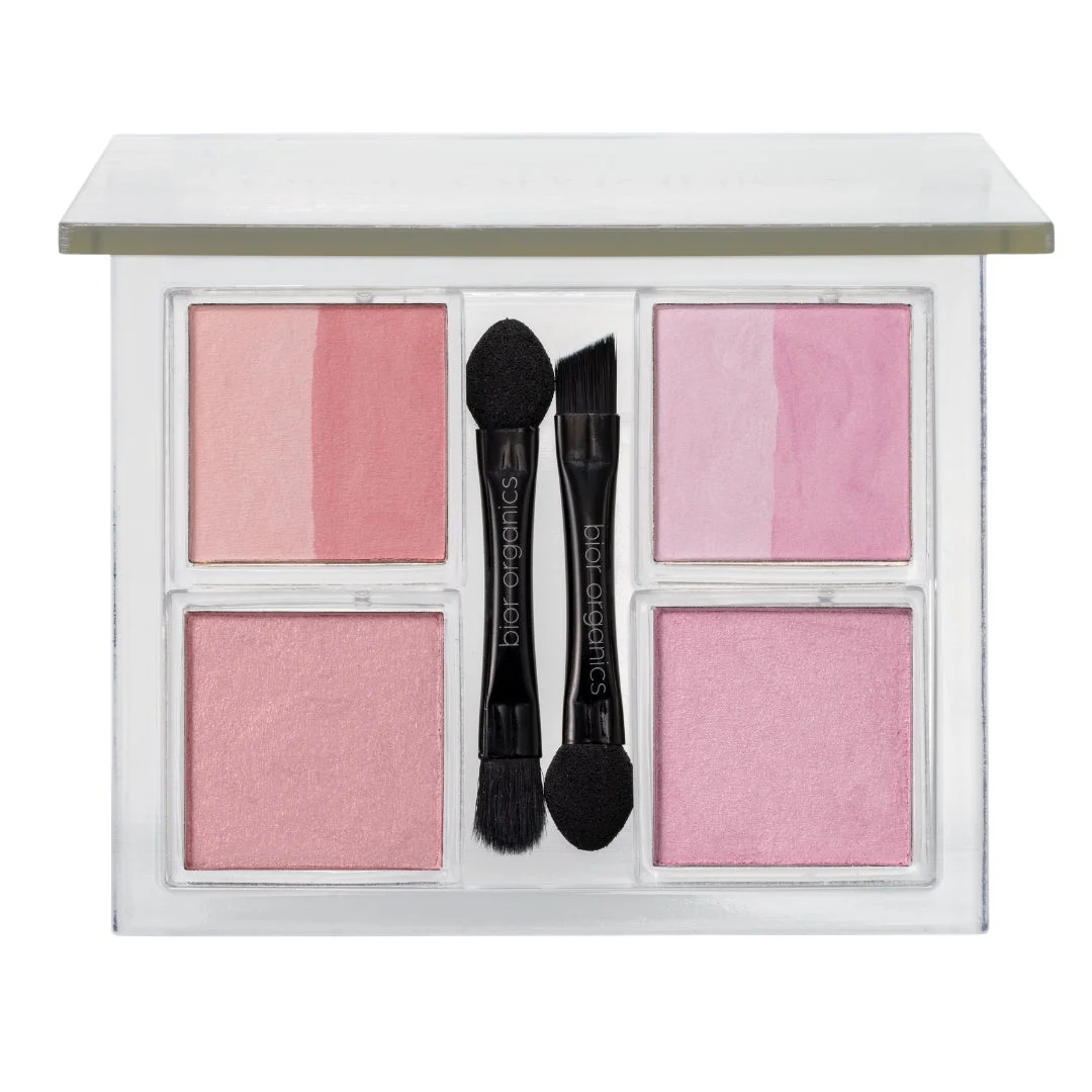 ピンク系のパウダー4色と2本のブラシがセットになったメイクアップパレット