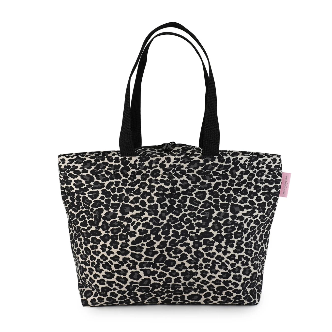 黒と白のヒョウ柄が特徴的なトートバッグです。黒い持ち手が付いており、右側には「Hervé Chapelier PARIS」と書かれたピンクのタグが見えます。ファッションアイテムとして日常使いに最適なデザインです。