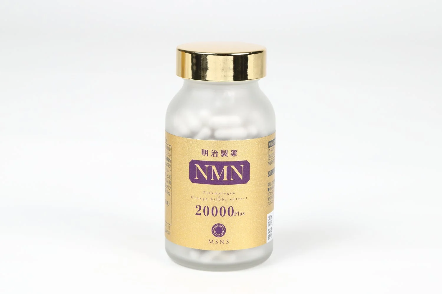 金色の蓋が付いた透明なボトルに入った明治製薬のNMNサプリメント